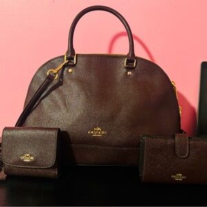Gently used Coach Hobo purse with small and medium wallet.